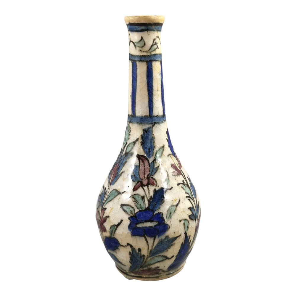 An Iranian Qajar ceramic bottle vase featuring an elongated neck, cream crackle glaze, and hand-painted blue and purple figurative portrait and floral motifs. View IV