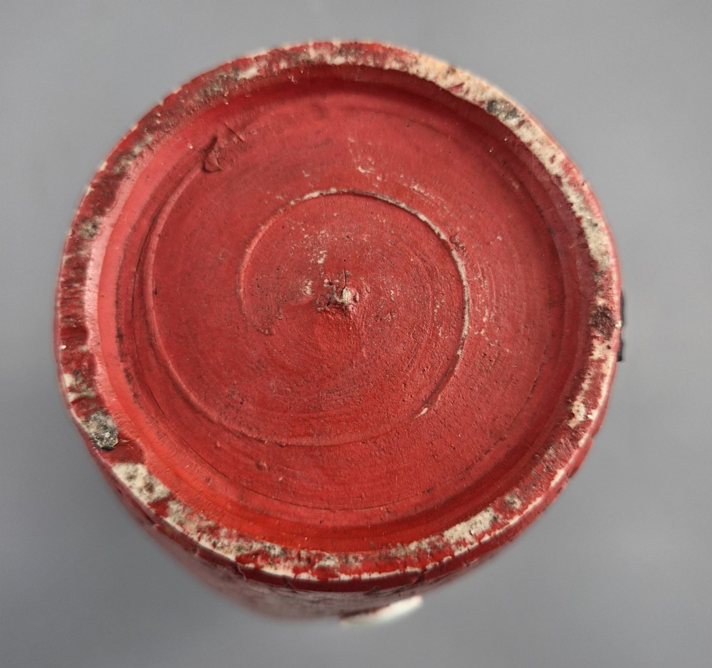 A Japanese Sumida Gawa terracotta vase with applied high-relief figures of a sage and child beneath a dripping lavender and dark flambe glaze. View XII