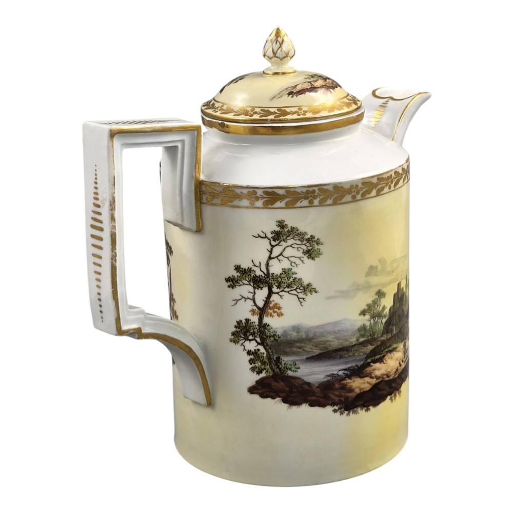 An 18th-century Furstenberg porcelain coffee pot featuring a hand-painted Neoclassical landscape, gold-leaf foliage rim, and an angular gilded handle with a pinecone finial lid. View III