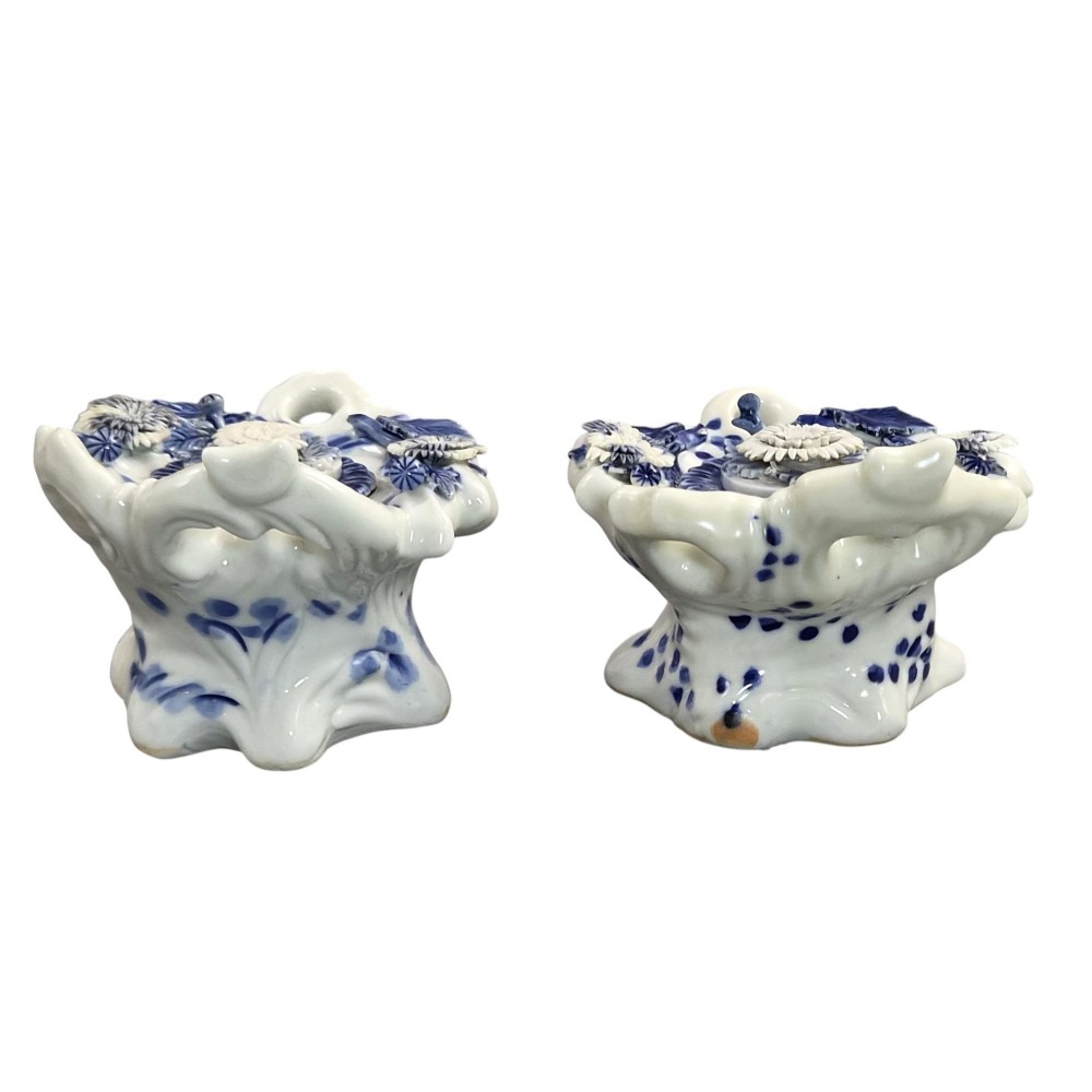 A pair of Japanese Hirado porcelain inkwells featuring fluted bases, underglaze blue decoration, and three-dimensional chrysanthemum motifs on the lids. View II