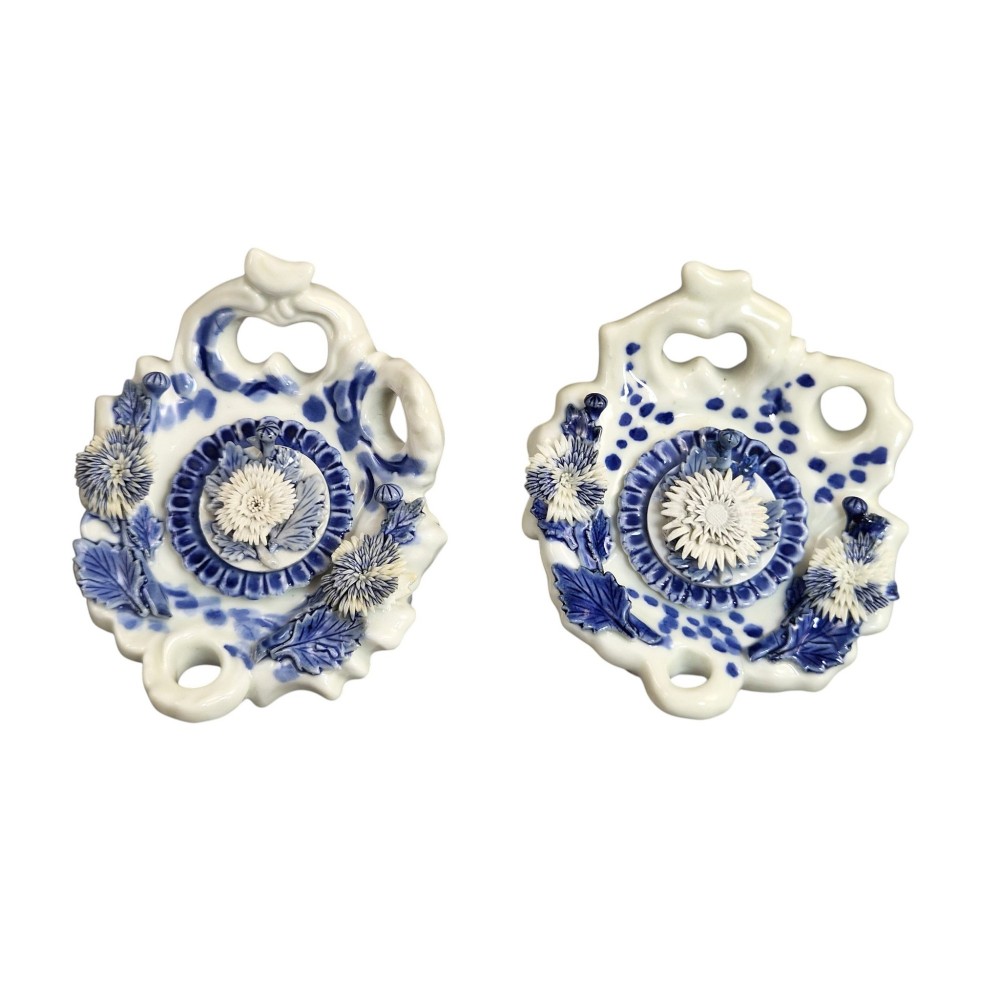 A pair of Japanese Hirado porcelain inkwells featuring fluted bases, underglaze blue decoration, and three-dimensional chrysanthemum motifs on the lids. View VI