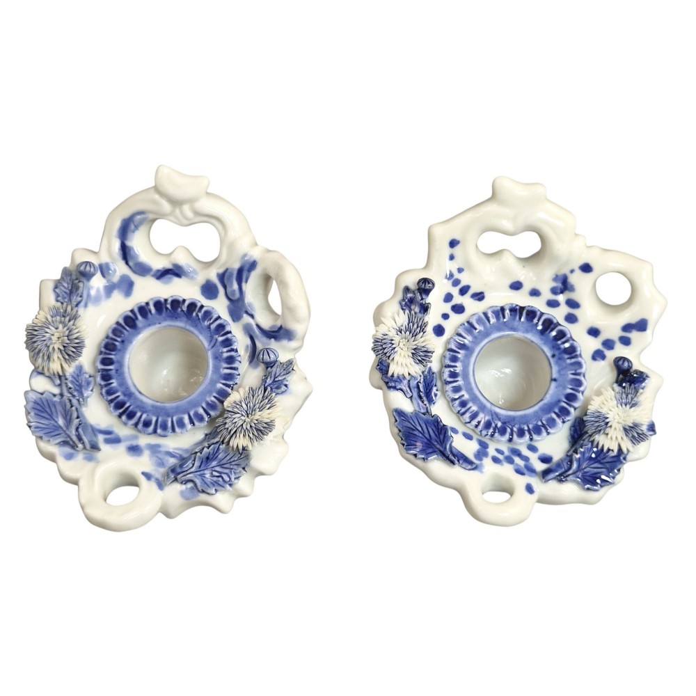 A pair of Japanese Hirado porcelain inkwells featuring fluted bases, underglaze blue decoration, and three-dimensional chrysanthemum motifs on the lids. View VII