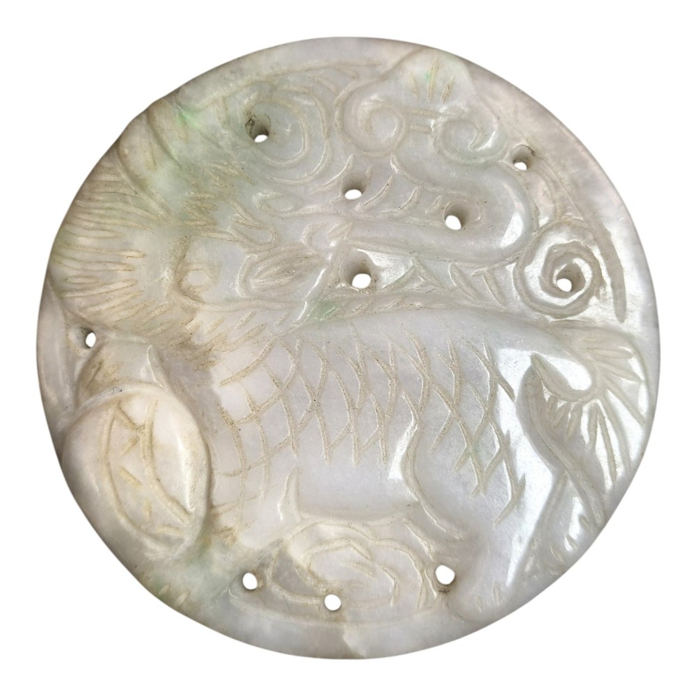 A group of three carved Chinese stone amulets featuring a carp, a central circular bi disc with a qilin, and a chilong dragon. View VIII