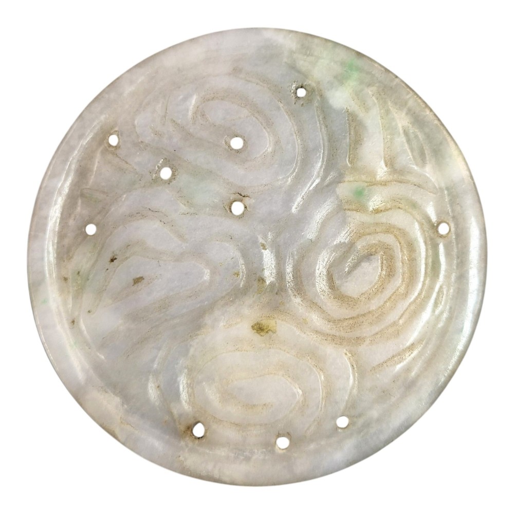 A group of three carved Chinese stone amulets featuring a carp, a central circular bi disc with a qilin, and a chilong dragon. View IX