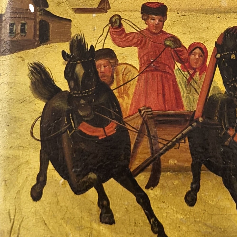 A rectangular 19th-century Russian lacquer cigarette case featuring a hand-painted scene of three horses pulling a sleigh across a snowy landscape on a gold background. View XII