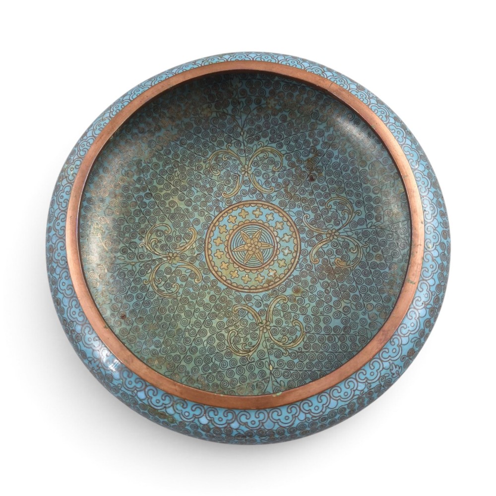 A low, rounded Chinese cloisonne enamel scholars brush washer featuring intricate wire scroll motifs on a turquoise blue ground with exposed metal rims. View VI
