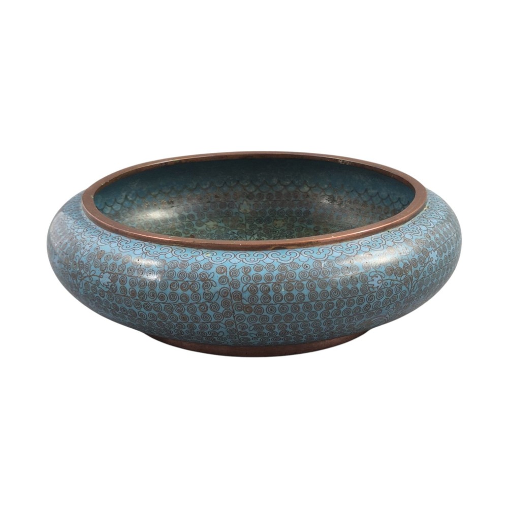A low, rounded Chinese cloisonne enamel scholars brush washer featuring intricate wire scroll motifs on a turquoise blue ground with exposed metal rims. View X