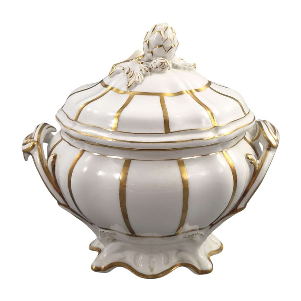 A Victorian Davenport bone china sauce tureen with lid and undertray, decorated with white glaze, gilded radial stripes, and an artichoke finial. View IX