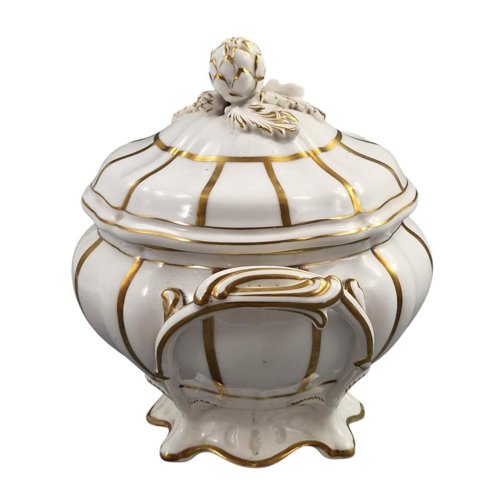 A Victorian Davenport bone china sauce tureen with lid and undertray, decorated with white glaze, gilded radial stripes, and an artichoke finial. View X