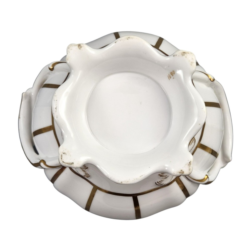 A Victorian Davenport bone china sauce tureen with lid and undertray, decorated with white glaze, gilded radial stripes, and an artichoke finial. View XII