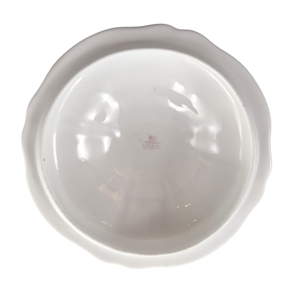 A Victorian Davenport bone china sauce tureen with lid and undertray, decorated with white glaze, gilded radial stripes, and an artichoke finial. View XIV