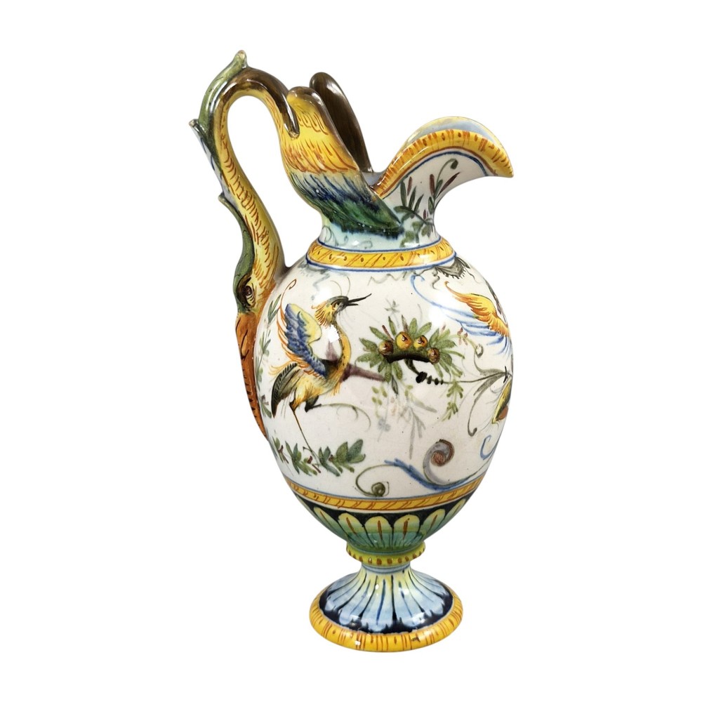 A pair of late 19th-century Italian Cantagalli tin-glazed majolica ceramic vessels, comprising a ruffled-rim vase and a sculpted ewer decorated with painted Renaissance grotesque motifs. View II