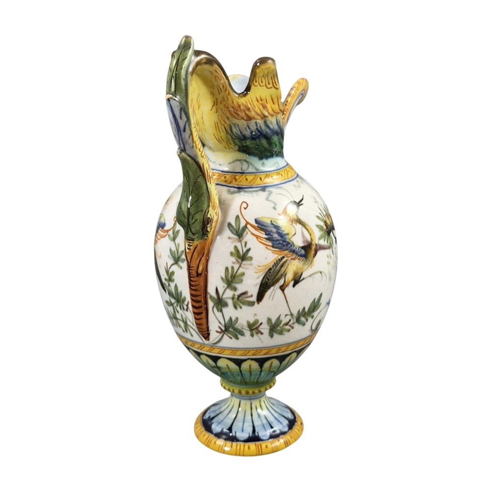 A pair of late 19th-century Italian Cantagalli tin-glazed majolica ceramic vessels, comprising a ruffled-rim vase and a sculpted ewer decorated with painted Renaissance grotesque motifs. View III