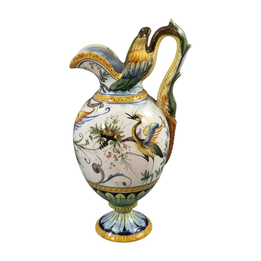 A pair of late 19th-century Italian Cantagalli tin-glazed majolica ceramic vessels, comprising a ruffled-rim vase and a sculpted ewer decorated with painted Renaissance grotesque motifs. View IV