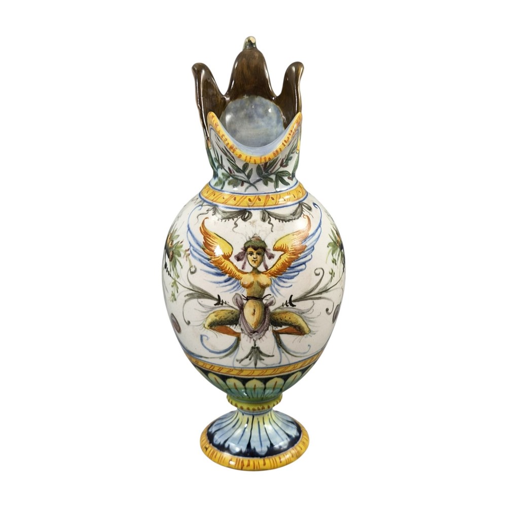 A pair of late 19th-century Italian Cantagalli tin-glazed majolica ceramic vessels, comprising a ruffled-rim vase and a sculpted ewer decorated with painted Renaissance grotesque motifs. View V