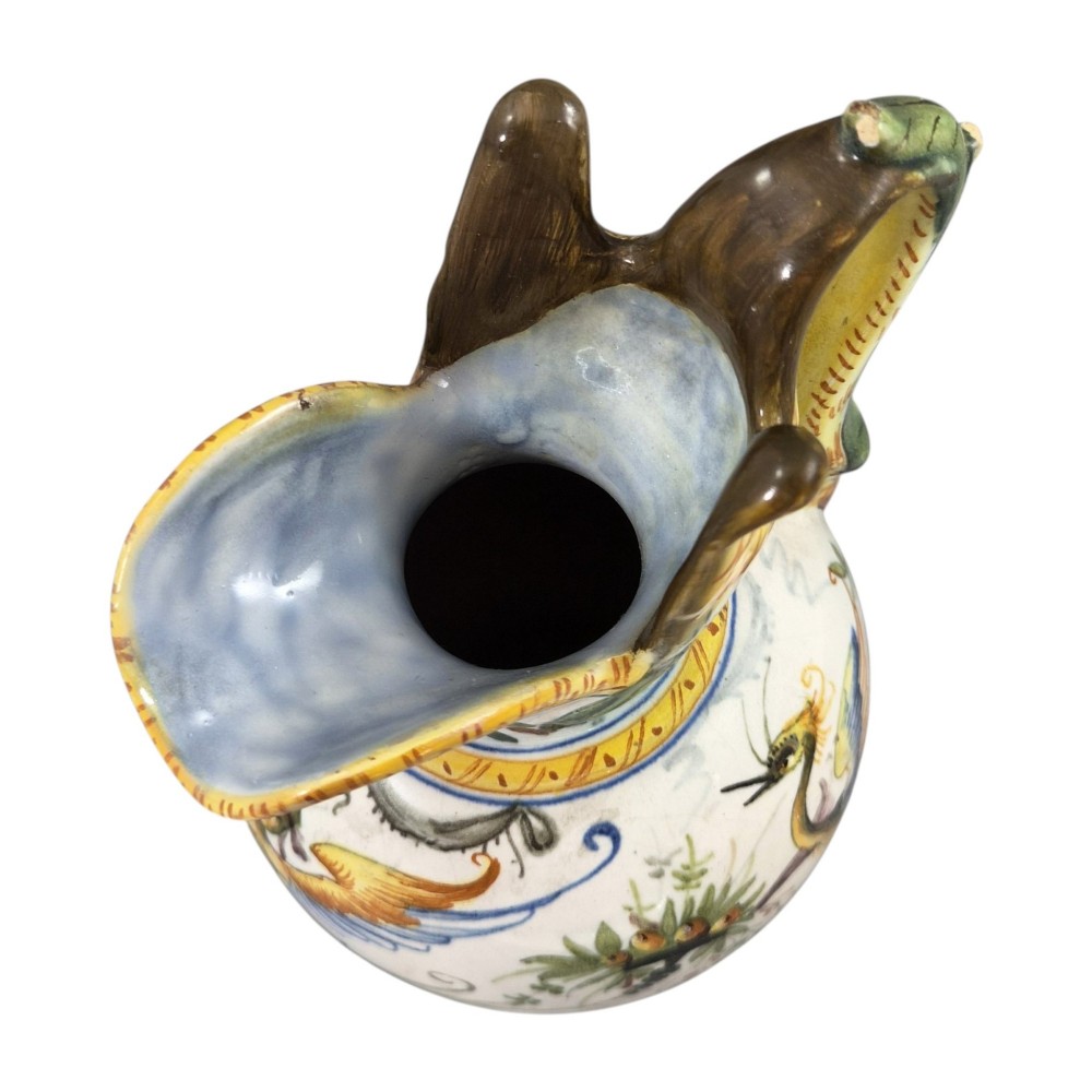 A pair of late 19th-century Italian Cantagalli tin-glazed majolica ceramic vessels, comprising a ruffled-rim vase and a sculpted ewer decorated with painted Renaissance grotesque motifs. View VI