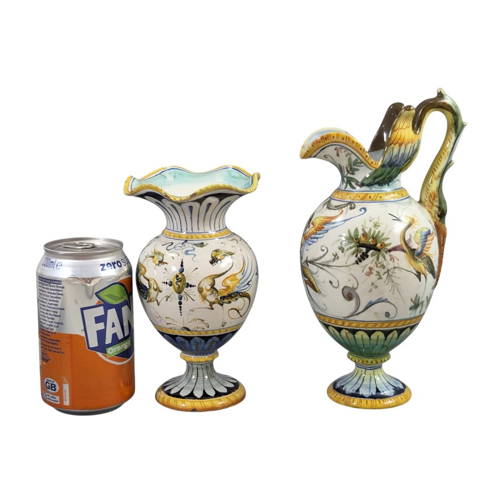 A pair of late 19th-century Italian Cantagalli tin-glazed majolica ceramic vessels, comprising a ruffled-rim vase and a sculpted ewer decorated with painted Renaissance grotesque motifs. View IX
