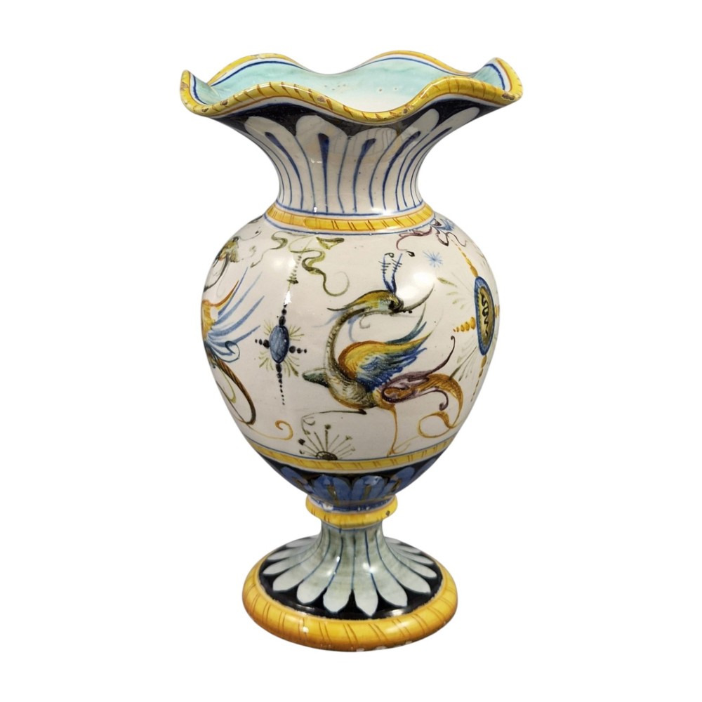 A pair of late 19th-century Italian Cantagalli tin-glazed majolica ceramic vessels, comprising a ruffled-rim vase and a sculpted ewer decorated with painted Renaissance grotesque motifs. View X