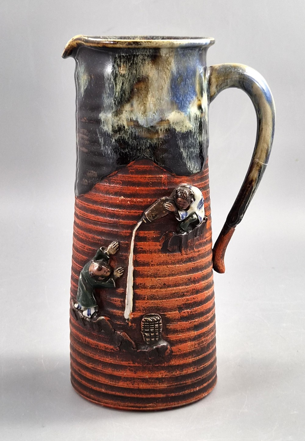 Japanese Sumida Gawa Pitcher, Sake Pouring Scene with Two Figures, Meiji–Taishō c.1900