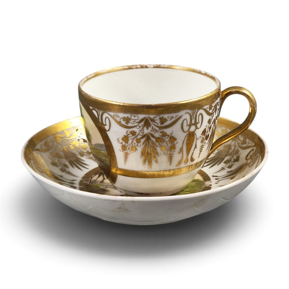 KPM Berlin Biedermeier Cabinet Cup and Saucer with Painted Landscapes, c.1830