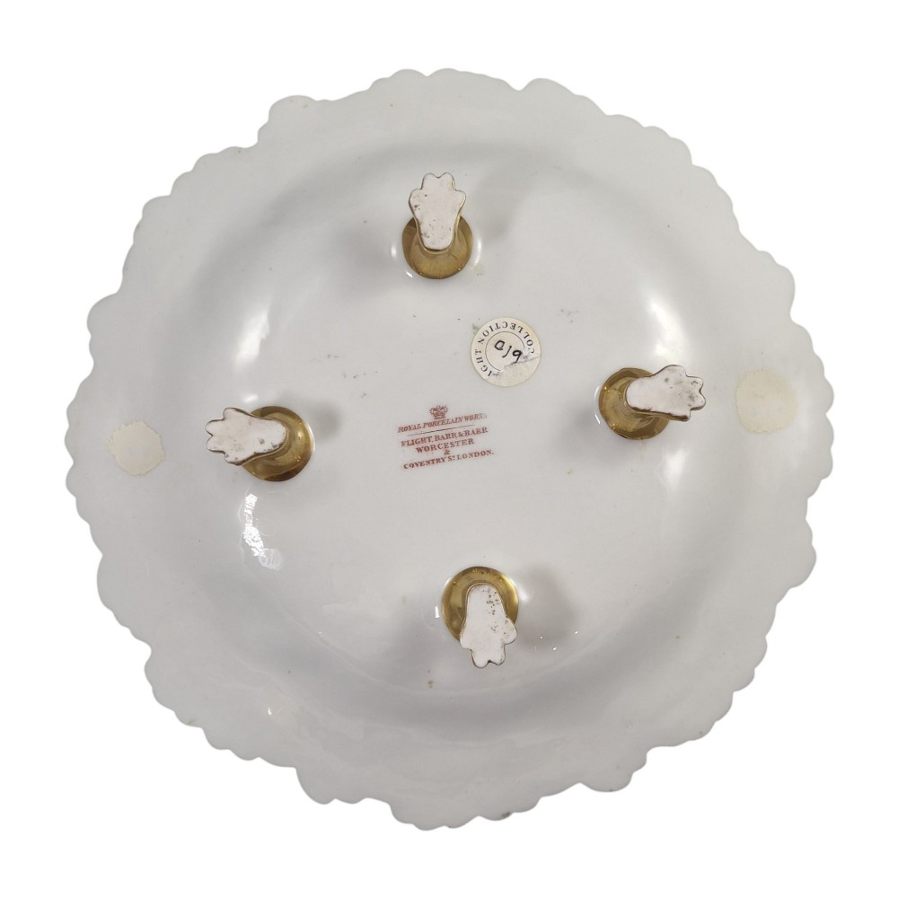 A Regency Flight, Barr and Barr Worcester porcelain handle basket featuring a bright green central reserve decorated with hand-painted butterflies and berries, surrounded by a leaf-moulded rim and gilt handle. View IX