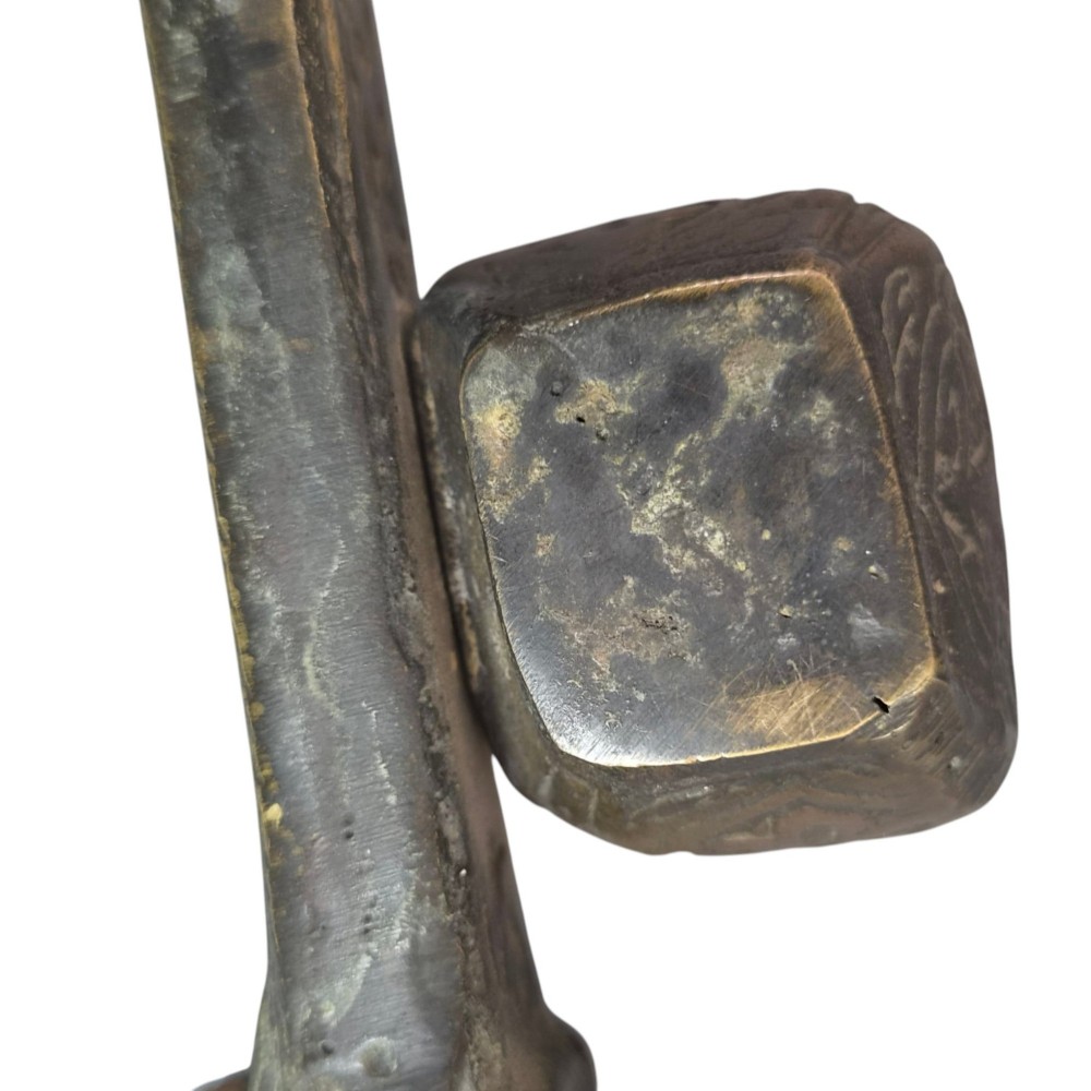 An antique cast and engraved brass travelling pen case and integrated inkwell featuring ornate scrollwork patterns and script. View XII