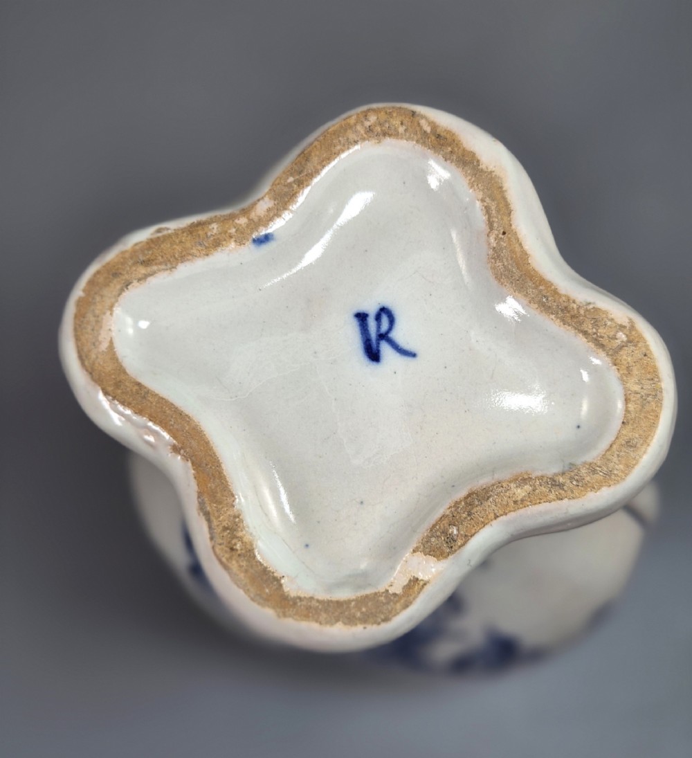 A pair of baluster-shaped blue and white hand-painted French faience vases featuring equestrian scenes and scrollwork motifs. View VII