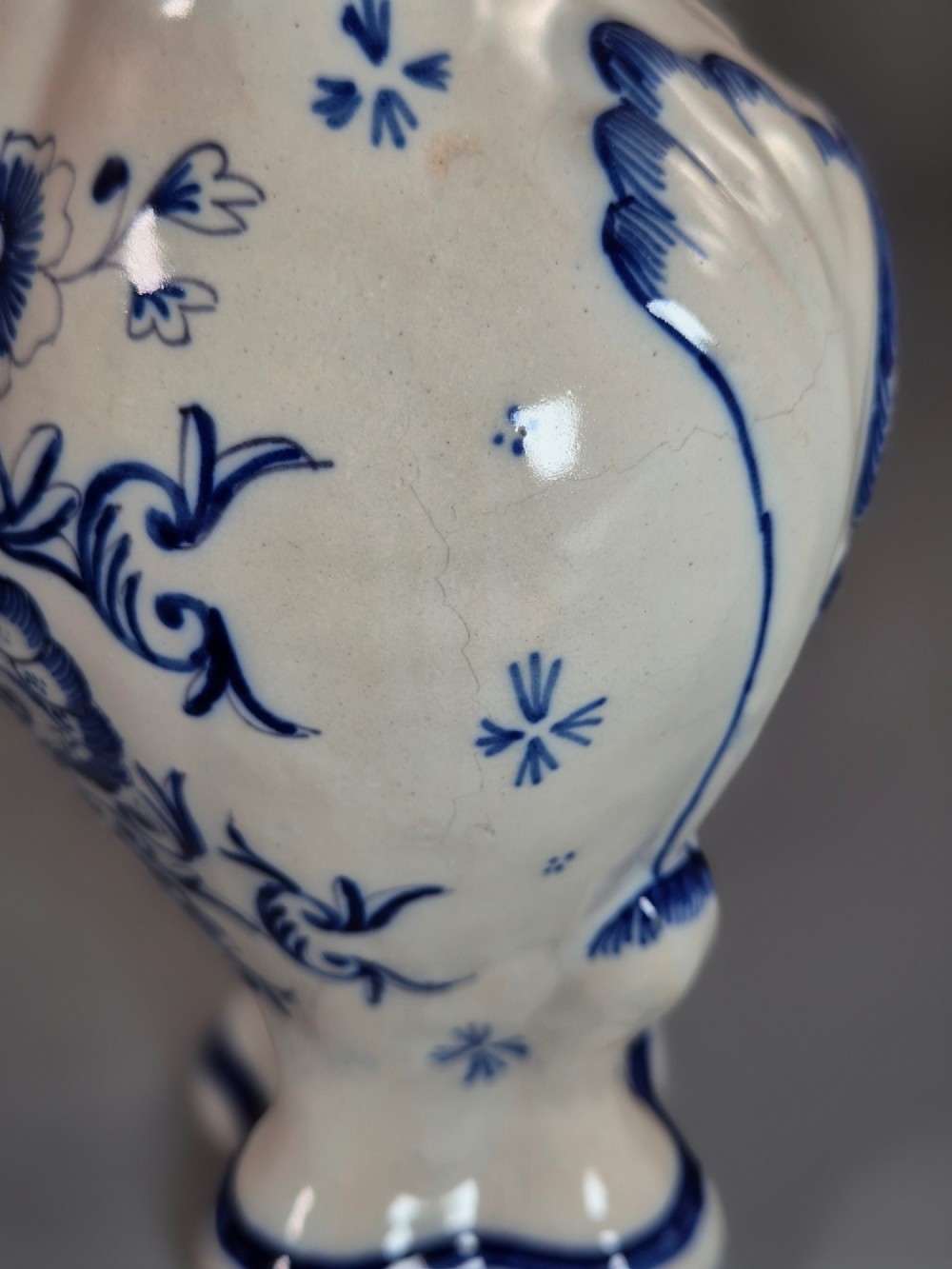 A pair of baluster-shaped blue and white hand-painted French faience vases featuring equestrian scenes and scrollwork motifs. View IX