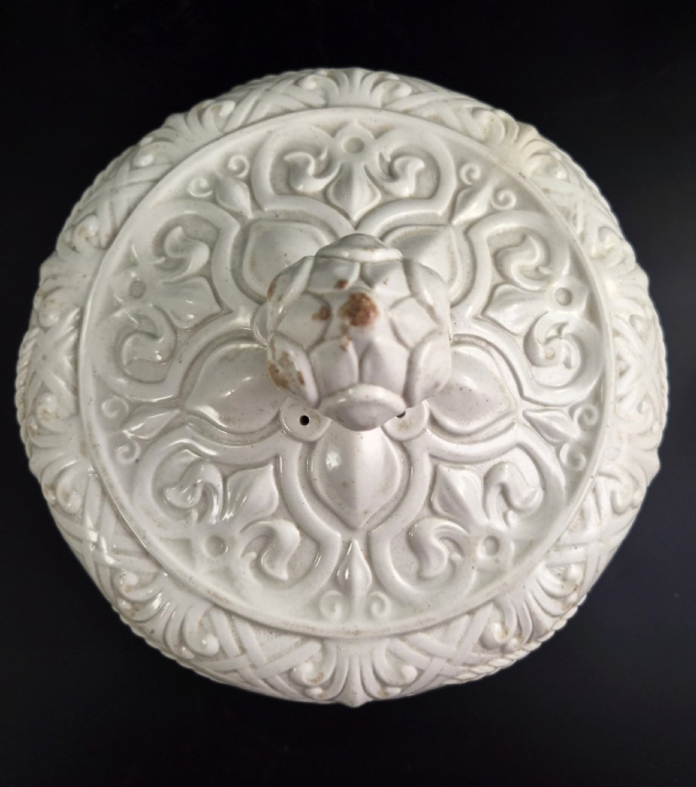An off-white Victorian ironstone cheese dome and matching circular stand with molded relief lattice work and wheat sheaf motifs. View XII