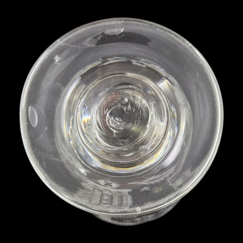 A clear lead-glass rummer featuring detailed wheel-engraved fraternal symbols, including a central cross, all-seeing eye, crowns, and floral garlands, resting on a short stem and circular foot. View XI