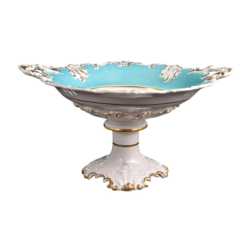 A Victorian Coalport bone china tazza featuring a turquoise border, central floral motif, gilded scroll accents, and a footed stem base. View IV