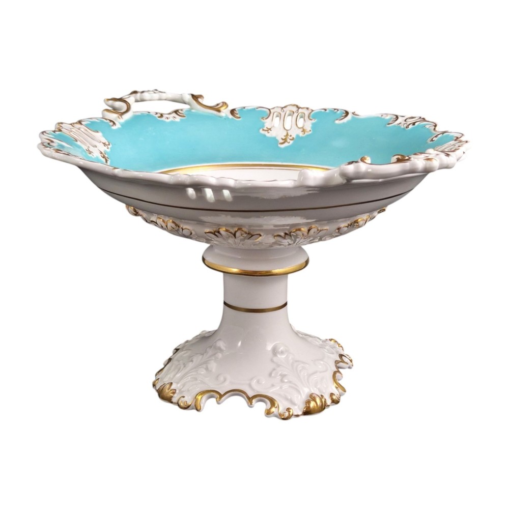 A Victorian Coalport bone china tazza featuring a turquoise border, central floral motif, gilded scroll accents, and a footed stem base. View VIII