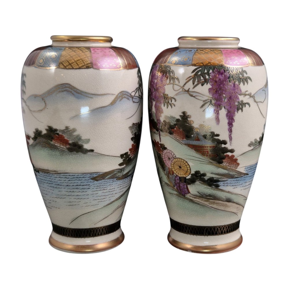 A pair of cream ceramic Satsuma vases decorated with hand-painted scenes of purple wisteria, figures in boats, and pagodas with gilded highlights. View VI