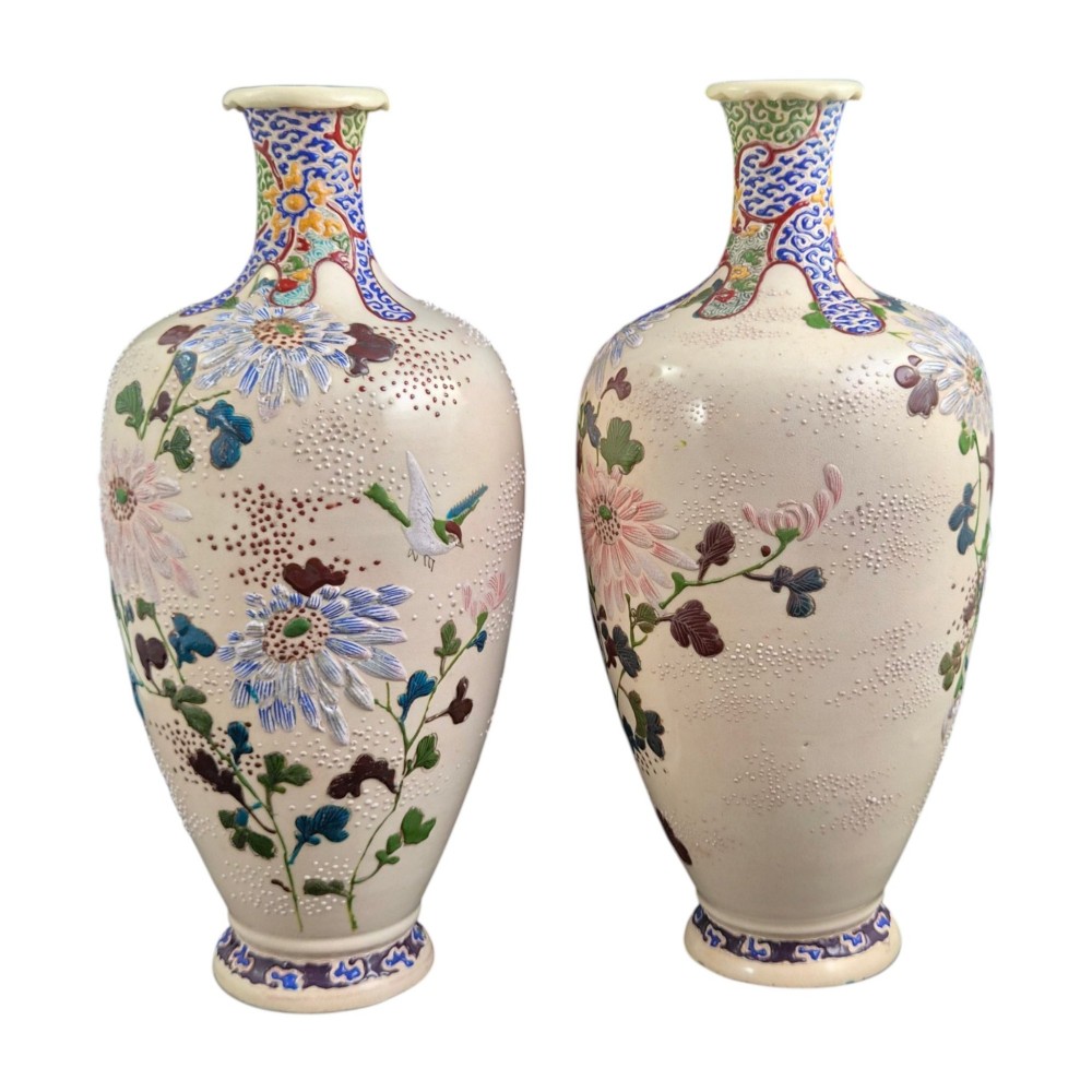 A pair of Japanese Satsuma earthenware vases decorated with raised moriage enamel chrysanthemums on a cream crackle background. View III