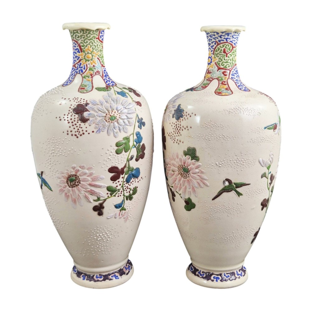 A pair of Japanese Satsuma earthenware vases decorated with raised moriage enamel chrysanthemums on a cream crackle background. View VI