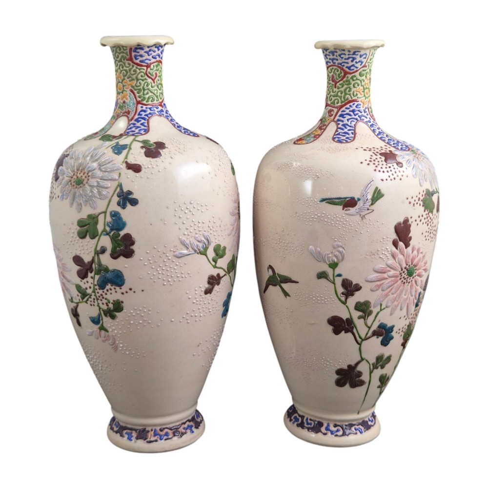 A pair of Japanese Satsuma earthenware vases decorated with raised moriage enamel chrysanthemums on a cream crackle background. View VII