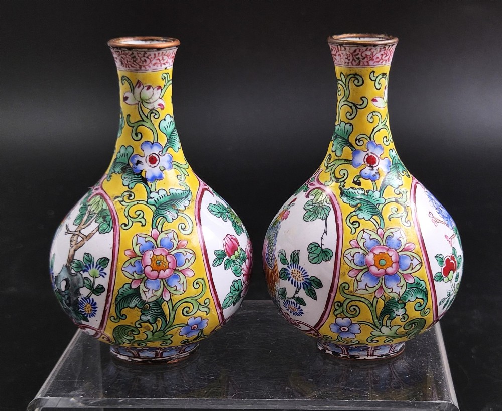 A pair of 19th-century Chinese Canton enamel miniature vases featuring hand-painted roosters and foliage framed within circular medallions against a bright yellow ground. View II