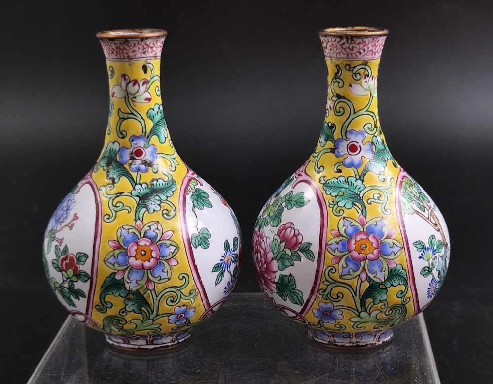 A pair of 19th-century Chinese Canton enamel miniature vases featuring hand-painted roosters and foliage framed within circular medallions against a bright yellow ground. View IV