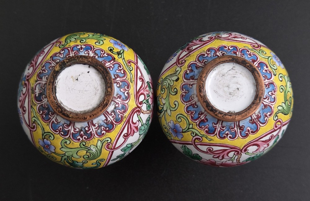 A pair of 19th-century Chinese Canton enamel miniature vases featuring hand-painted roosters and foliage framed within circular medallions against a bright yellow ground. View VI
