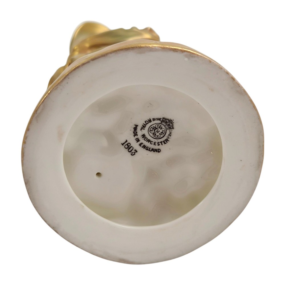 A pair of mid-century Royal Worcester bone china figurines depicting Strephon playing a pipe instrument and Phyllis playing a tambourine, finished in metallic gold and off-white porcelain. View VIII