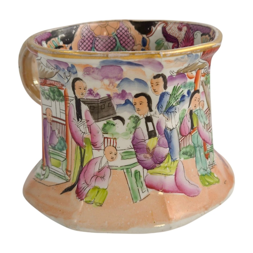 An antique Masons ironstone cider mug featuring a red scale background, hand-painted Chinoiserie panels, a flared base, and a sculpted hydra handle. View VI