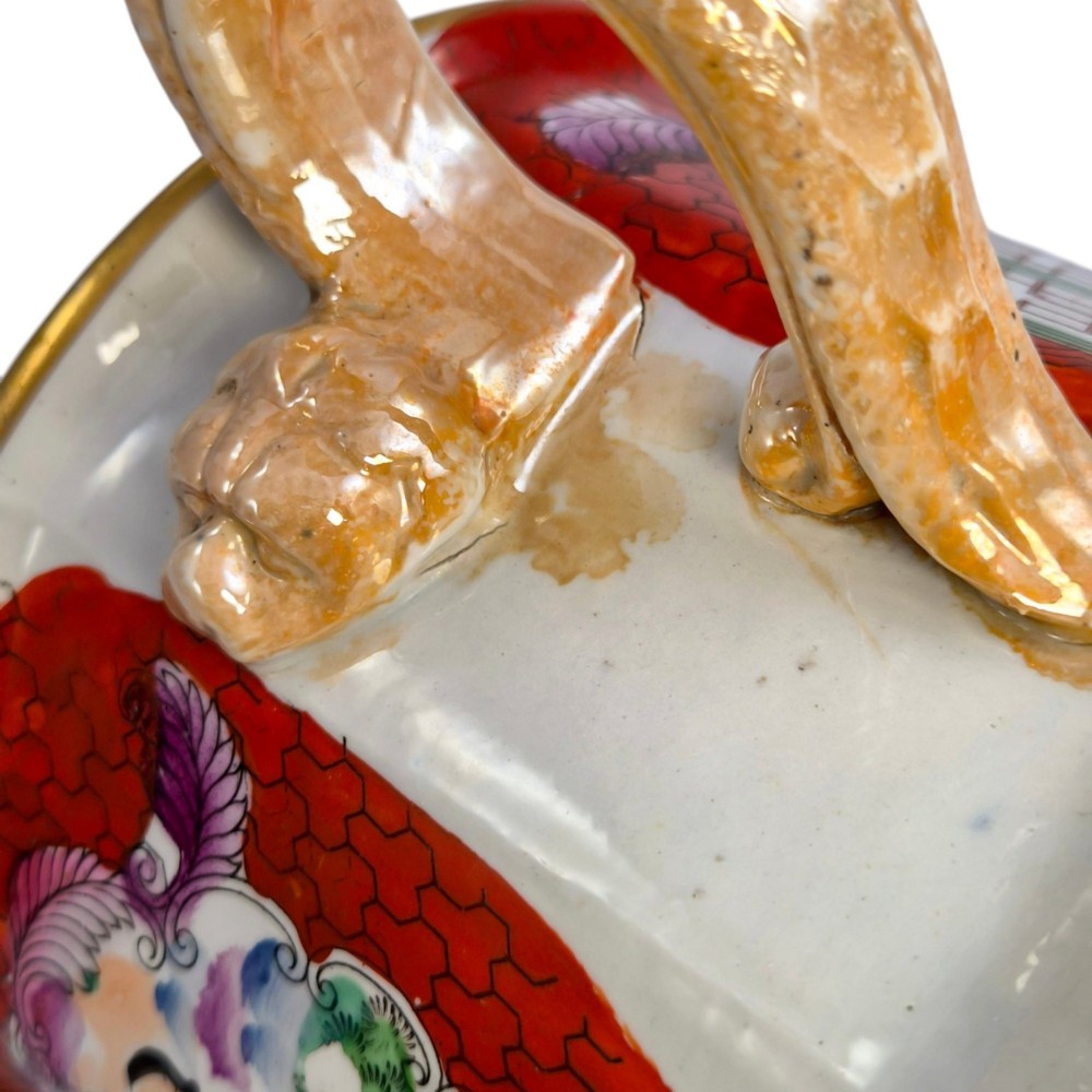 An antique Masons ironstone cider mug featuring a red scale background, hand-painted Chinoiserie panels, a flared base, and a sculpted hydra handle. View XIV