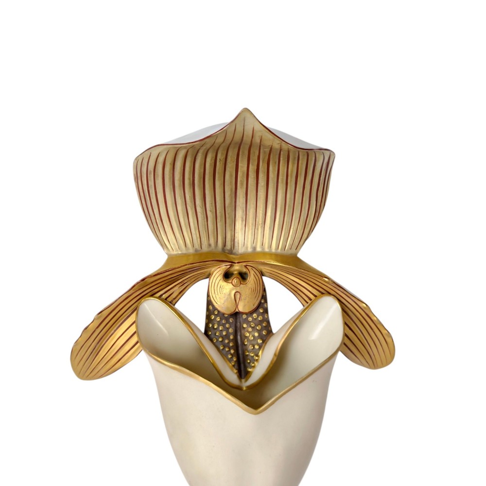A pair of 1886 Royal Worcester ivory porcelain wall pockets shaped like ladys slipper orchids with gold gilded highlights. View IV