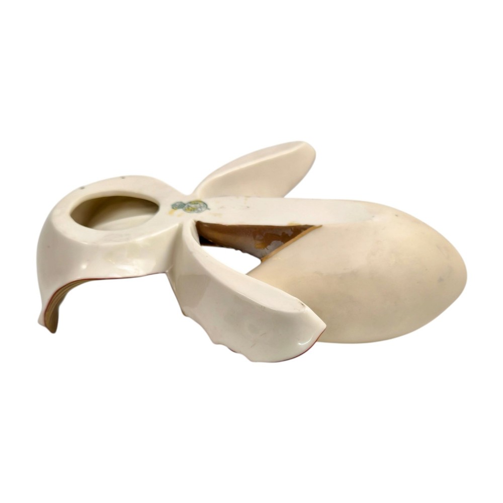 A pair of 1886 Royal Worcester ivory porcelain wall pockets shaped like ladys slipper orchids with gold gilded highlights. View VI