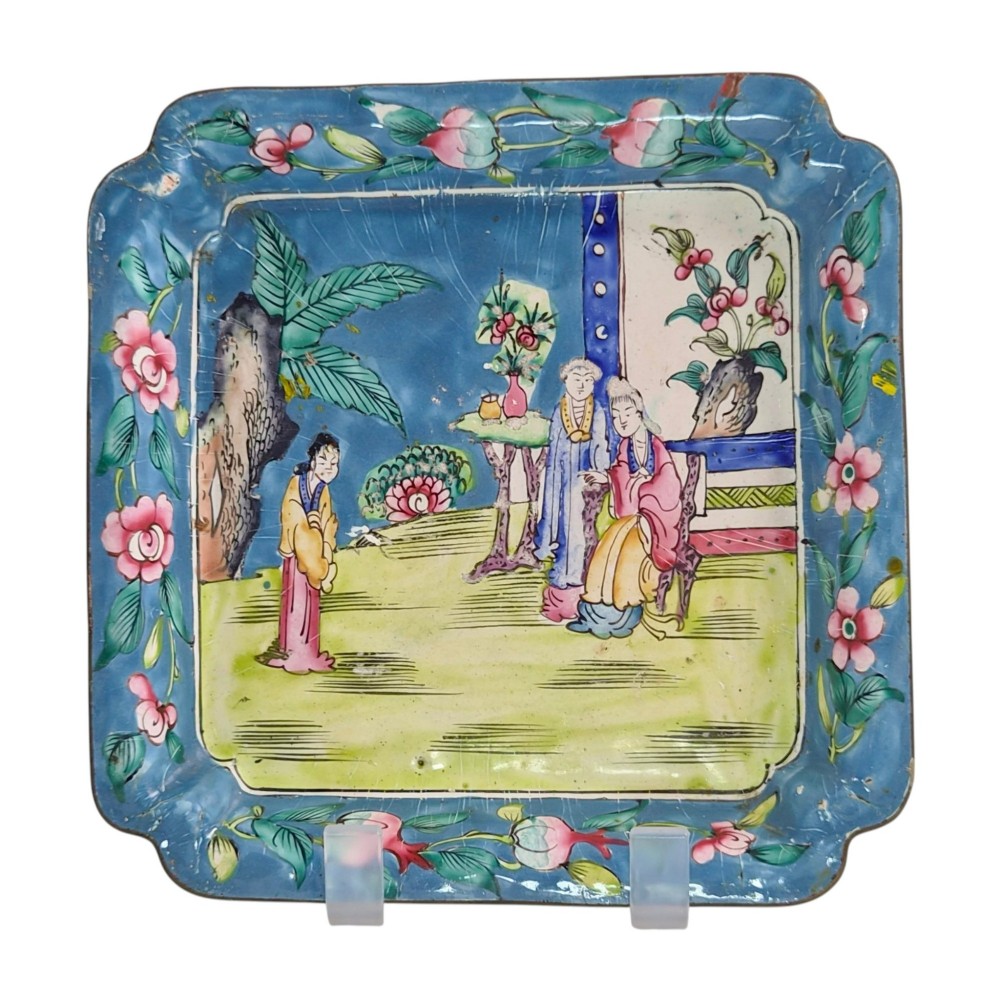 An 18th-century square Chinese Canton enamel dish featuring a blue floral border and a central hand-painted figural scene.