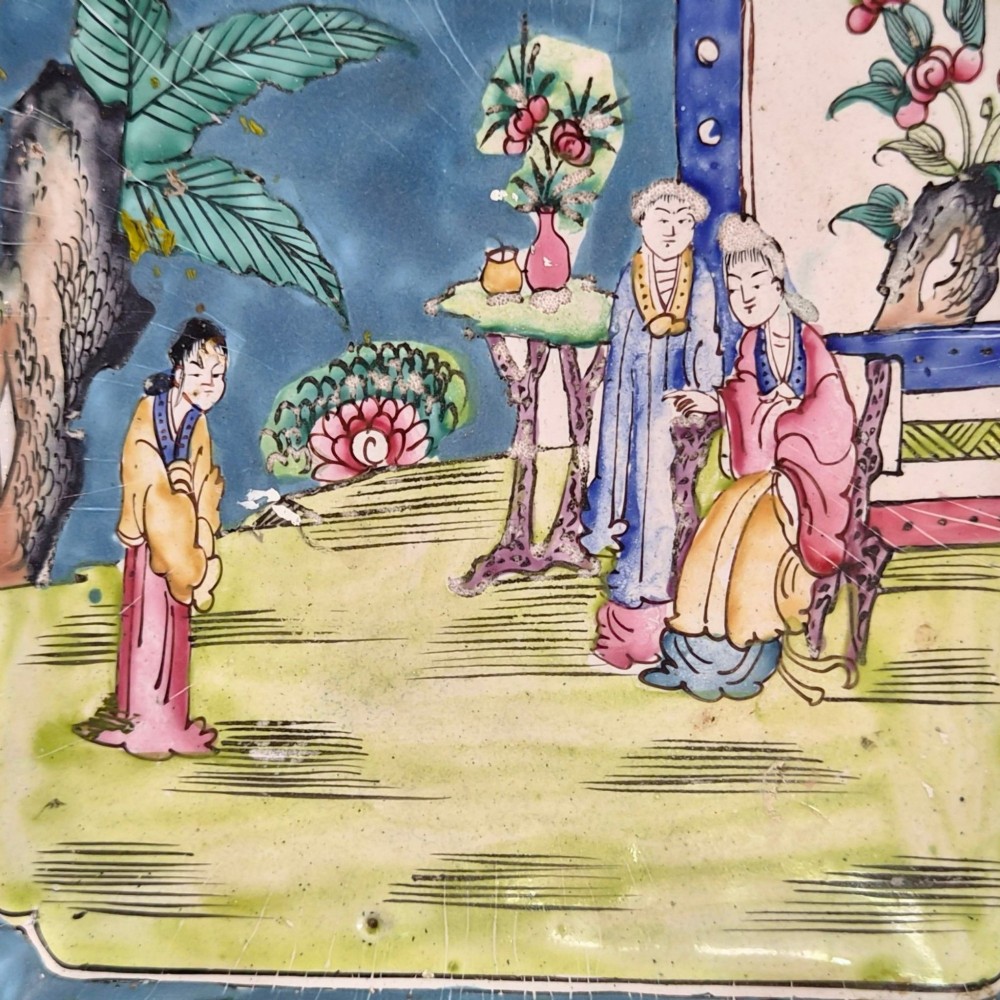 An 18th-century square Chinese Canton enamel dish featuring a blue floral border and a central hand-painted figural scene. View II