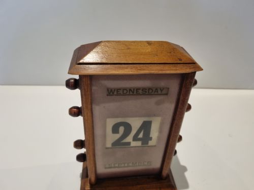 fig 1. Antique walnut perpetual calendar 8 1/2