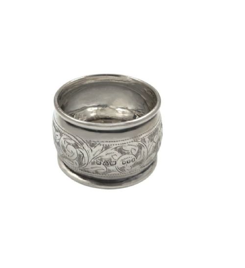 A set of six engraved sterling silver napkin rings arranged inside a black fitted presentation case lined with bright blue silk. View VIII