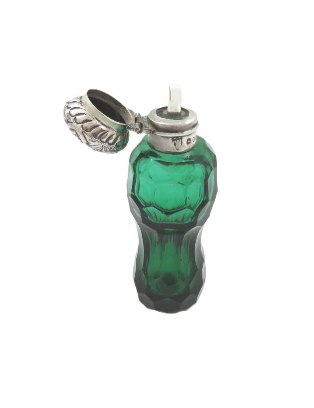 A late Victorian faceted green cut glass scent bottle featuring an engraved sterling silver collar and cap. View VII