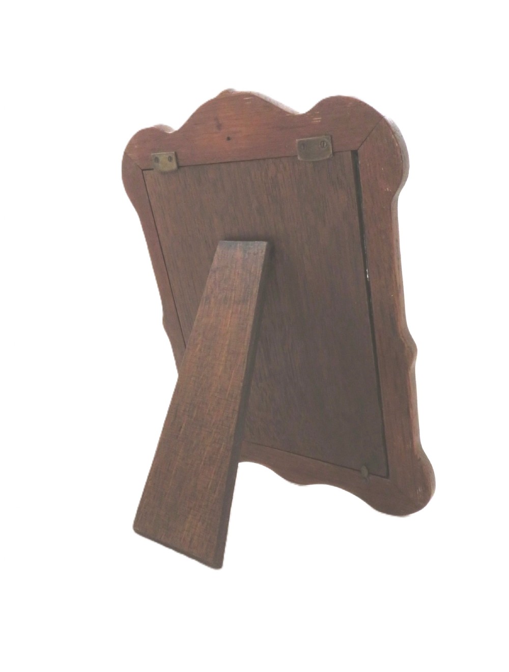 An Art Nouveau sterling silver photo frame with sinuous, organic border detailing and a dark backing. View VIII
